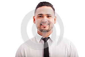 Hispanic man wearing a tie