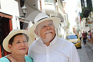 Hispanic senior couple with copy space