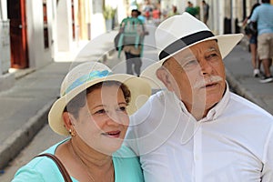 Hispanic senior couple with copy space