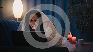 Hispanic smiling happy laughing woman Arabian girl using computer browsing laptop say wow amazed wonder surprised at