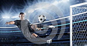 Hispanic Soccer Player kicking the ball photo