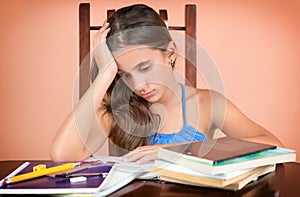 Hispanic student exhausted after studying too much