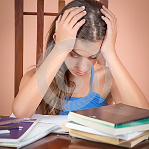 Hispanic student exhausted after studying too much