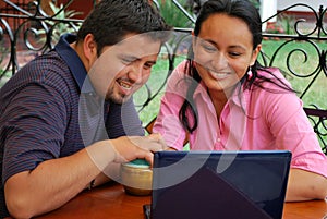 Hispanic students on a laptop