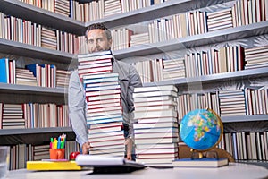 hispanic teacher in college. Man with books in library. Knowledge and education. school library. Teachers day. Teacher