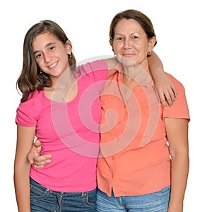 Hispanic teenage girl and her grandmother isolated on white