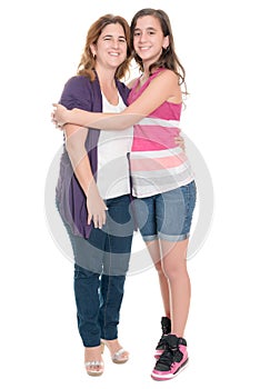 Hispanic teenage girl hugging her mother isolated on white