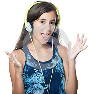Hispanic teenage girl listening to music on her headphones