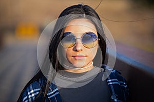 Hispanic teenage girl with sunglasses