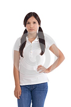 Hispanic teenager in jeans and white polo t-shirt