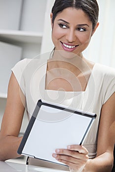 Hispanic Woman Businesswoman Using Tablet Computer