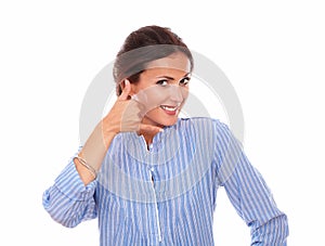 hispanic woman with call gesture