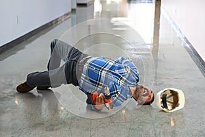 Hispanic Worker Falling on Floor