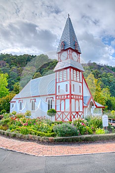 Historial church and windmill at Founders Heritage Park at Nelson, New Zealand