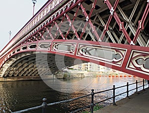 The historic 19th century crown point bridge crossing the river aire in leeds