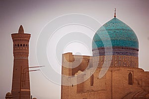 Historic ancient islam building and tower ruin, Bukhara, Uzbekistan photo