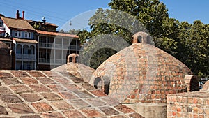 Historic ancient round building surrounded by a forest