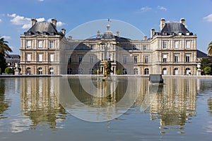 Historic architecture reflecting on the water