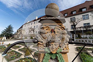 Historic baroque garden with castle and sculpture