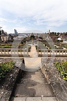 Historic baroque garden with castle and stone fence