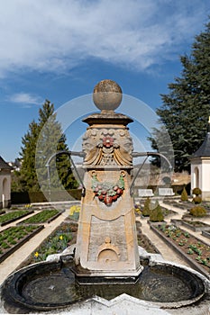 Historic baroque garden with water fountain