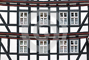 Historic black-and-white half-timbered house in medieval small town of Schlitz Vogelsberg, Germany