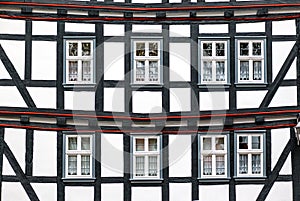 Historic black-and-white half-timbered house in medieval small town of Schlitz Vogelsberg, Germany photo