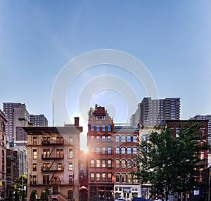 Historic block of buildings with sunlight background in the Tribeca neighborhood of Manhattan in New York City