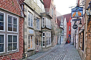 Cobblestone Road and old Houses in Historic Schnoor Neighborhood photo