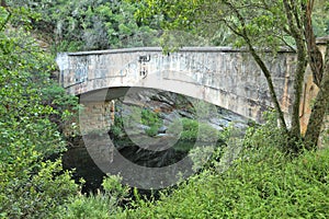 HISTORIC BRIDGE OVER SWART RIVER NEAR GEORGE, WESTERN CAPE.