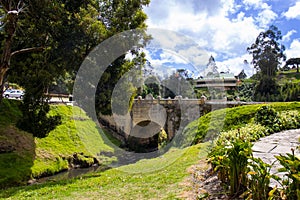 Historic Bridge over the Teatinos River in Colombia located next to the Boyaca Bridge photo