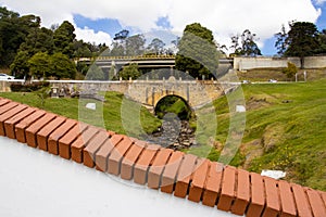 Historic Bridge over the Teatinos River in Colombia located next to the Boyaca Bridge photo