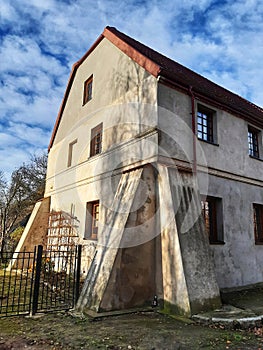 Historic building exterior with facade and blue sky