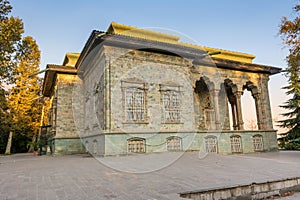 Historic building of green palace Shahvand House of Iranian visitor walking in Sa`dabad palace Complex, built by the Qajar and photo