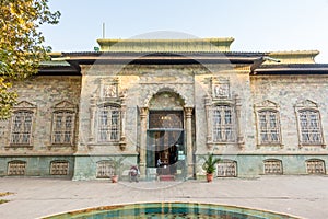 Historic building of green palace Shahvand House of Iranian visitor walking in Sa`dabad palace Complex, built by the Qajar and photo