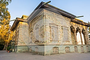Historic building of green palace Shahvand House of Iranian visitor walking in Sa`dabad palace Complex, built by the Qajar and photo