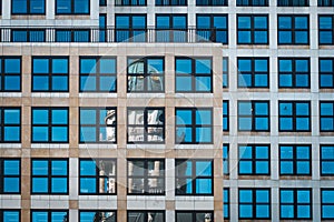 Historic building reflection in window glass facade, Gendarmentmarkt