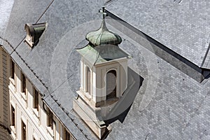 Historic building with slate roof and traditional dormer