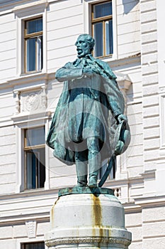 Historic building and statue Kossuth Lajos in Pecs