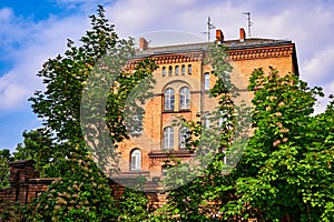 Historic building from the 19th century as part of the former barracks of the Prussian railway regiments photo