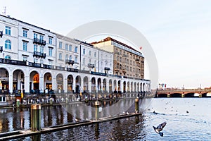 Historic buildings with arcade at Alster Lake in Hamburg
