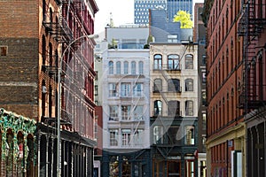 Historic buildings at the intersection of Crosby and Howard Street in the SOHO neighborhood of Manhattan, New York City NYC