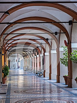 Historic buildings in Piacenza, Italy. Portico