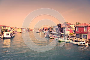 Historic buildings at sunset on the banks of the canal in Venice