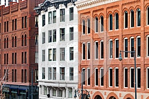 Block of historic buildings in downtown Denver, Colorado photo