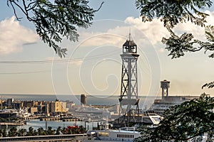 historic cabin, steel towers, harbor and Barcelona city, spain