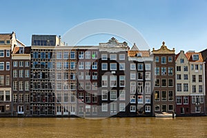Historic canal houses on the Damrak.
