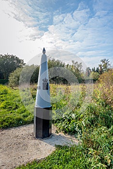 Historic cast iron border post numbered 218 on the border between the Netherlands and Belgium near the Dutch village of Galder, N