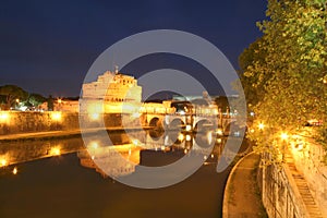 Historic castle floodlit at night