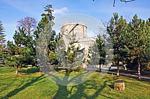 Historic castle through shadow past